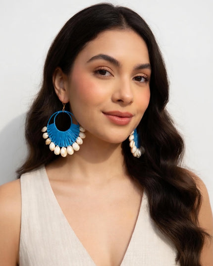 Vibrant Blue and White Tribal Print Maxi Dress with Statement Earrings & Hibiscus hair flower.