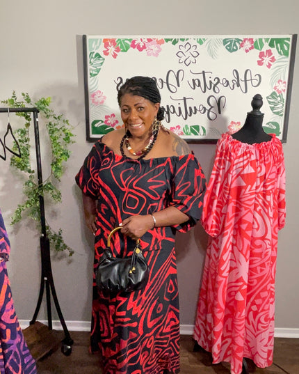 Red and Black Tribal Print Chiffon Maxi Dress with Statement Earrings and Hibiscus Hair Flower